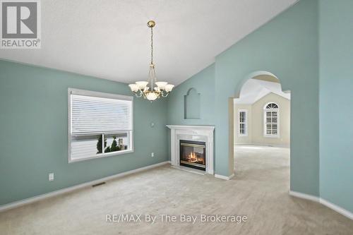 Dining Area with 2 Sided Gas Fireplace - 12 Goldsmith Place, Wasaga Beach, ON - Indoor With Fireplace