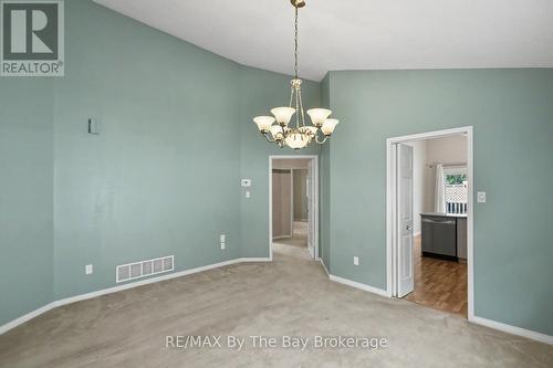 Dining Area With Entrance to Kitchen and Bedrooms - 12 Goldsmith Place, Wasaga Beach, ON - Indoor Photo Showing Other Room