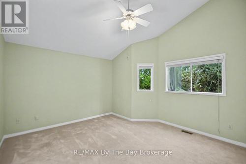 Primary Bedroom With Walk-In Closet - 12 Goldsmith Place, Wasaga Beach, ON - Indoor Photo Showing Other Room