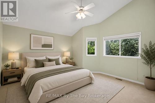 Primary Bedroom Virtually Staged - 12 Goldsmith Place, Wasaga Beach, ON - Indoor Photo Showing Bedroom