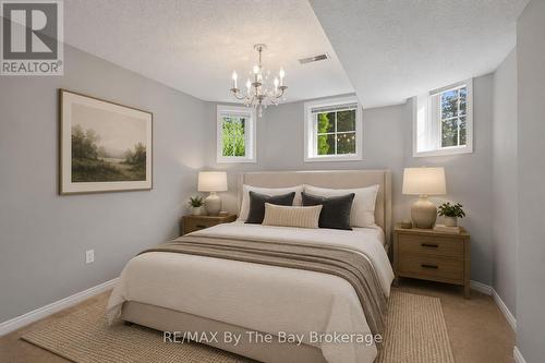 1st Bedroom Virtually Staged - 12 Goldsmith Place, Wasaga Beach, ON - Indoor Photo Showing Bedroom