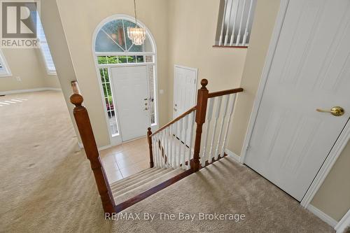 Front Foyer with Garage Access Door - 12 Goldsmith Place, Wasaga Beach, ON - Indoor Photo Showing Other Room