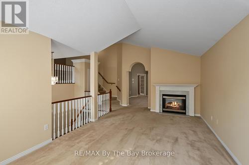 Living Area with 2 Sided Gas Fireplace - 12 Goldsmith Place, Wasaga Beach, ON - Indoor With Fireplace
