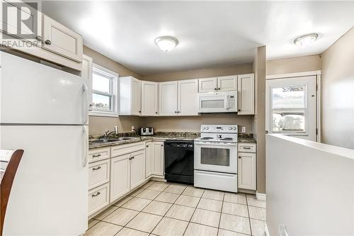 6 Des Pins Street, Field, ON - Indoor Photo Showing Kitchen With Double Sink