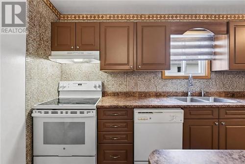 3066 River Road, Val Caron, ON - Indoor Photo Showing Kitchen With Double Sink