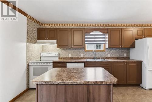 3066 River Road, Val Caron, ON - Indoor Photo Showing Kitchen With Double Sink