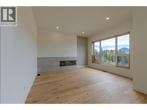 1654 Howse Pass, Golden, BC - Indoor With Fireplace
