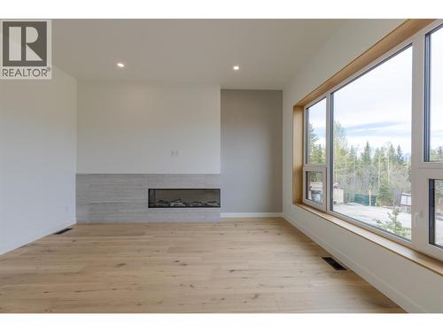 1654 Howse Pass, Golden, BC - Indoor With Fireplace