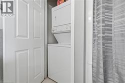 Stackable washer and dryer unit within a dedicated closet - 
