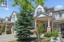 Brick and siding exterior featuring a covered front porch with decorative columns - 36 Van Fleet Terrace, Milton, ON  - Outdoor With Facade 