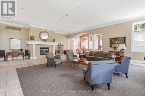 307 - 2035 Appleby Line, Burlington, ON - Indoor Photo Showing Living Room With Fireplace