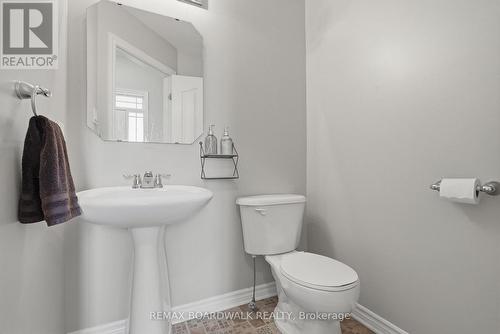 Handy powder room at main entrance - 617 Spikemoss Place, Ottawa, ON - Indoor Photo Showing Bathroom