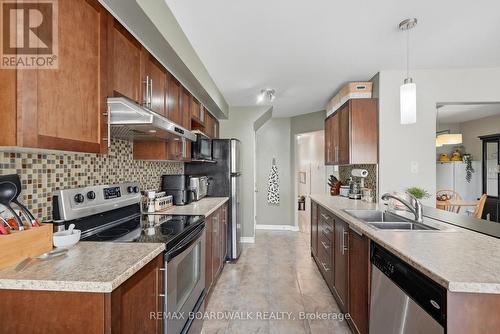 Stainless appliances are included - 617 Spikemoss Place, Ottawa, ON - Indoor Photo Showing Kitchen With Double Sink With Upgraded Kitchen