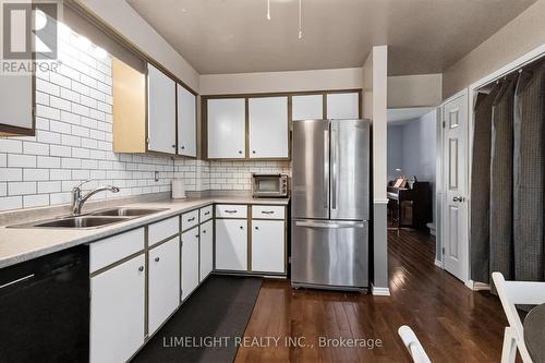 12 - 1250 Jalna Boulevard, London South (South X), ON - Indoor Photo Showing Kitchen With Stainless Steel Kitchen With Double Sink