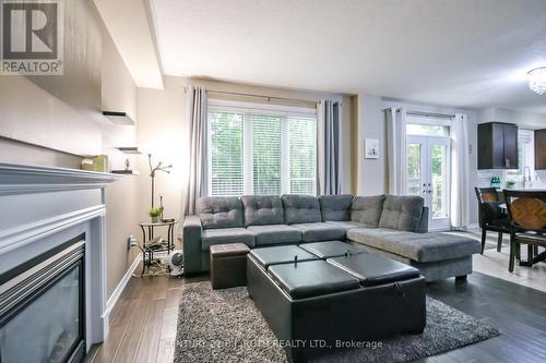 Open concept family room with gas fireplace. - 20 Falcon Crescent, Barrie, ON - Indoor Photo Showing Living Room With Fireplace