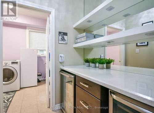 Convenient butlers pantry with 2 fridges! - 20 Falcon Crescent, Barrie, ON - Indoor Photo Showing Laundry Room