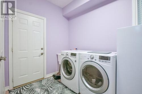Main floor laundry room w garage access! - 20 Falcon Crescent, Barrie, ON - Indoor Photo Showing Laundry Room