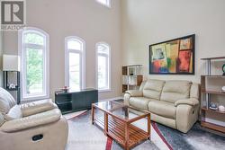 Living room with amazing windows! - 
