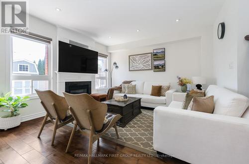 15 Hesham Drive, Whitby, ON - Indoor Photo Showing Living Room With Fireplace