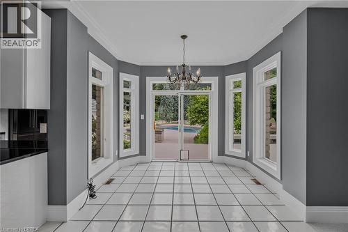Bay window area featuring white tile flooring, gray walls, and white trim - 44 St Andrew'S Drive, Brantford, ON - 