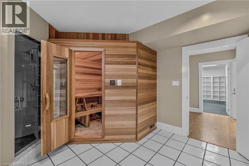 Dedicated sauna room with wood paneling and interior bench seating - 44 St Andrew'S Drive, Brantford, ON - Indoor Photo Showing Other Room