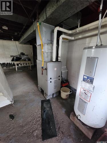 215 Menzies Street, North Portal, SK - Indoor Photo Showing Basement
