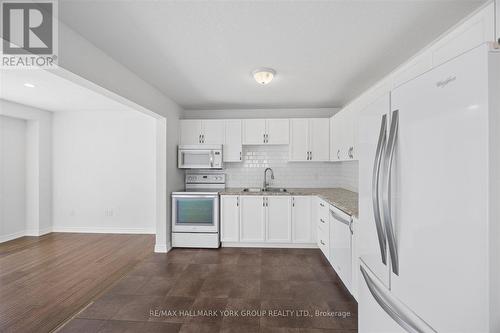 132 Banting Crescent, Essa, ON - Indoor Photo Showing Kitchen With Double Sink