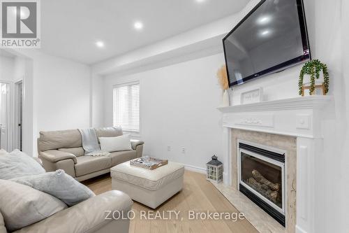 1911 Swan Street, Innisfil, ON - Indoor Photo Showing Living Room With Fireplace
