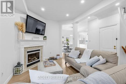 1911 Swan Street, Innisfil, ON - Indoor Photo Showing Living Room With Fireplace