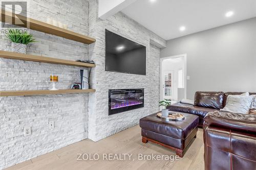 1911 Swan Street, Innisfil, ON - Indoor Photo Showing Other Room With Fireplace