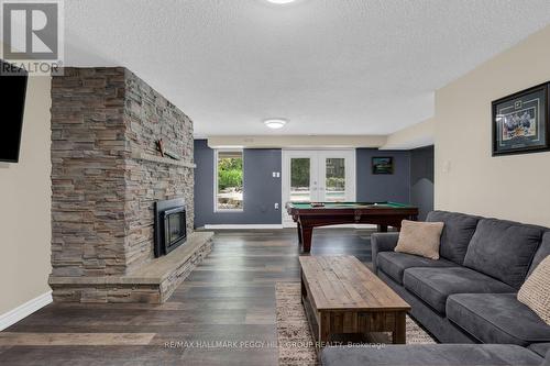 3644 Shadow Creek Road, Severn, ON - Indoor Photo Showing Living Room With Fireplace