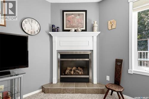 28 Rosedale Avenue, Katepwa Beach, SK - Indoor Photo Showing Living Room With Fireplace