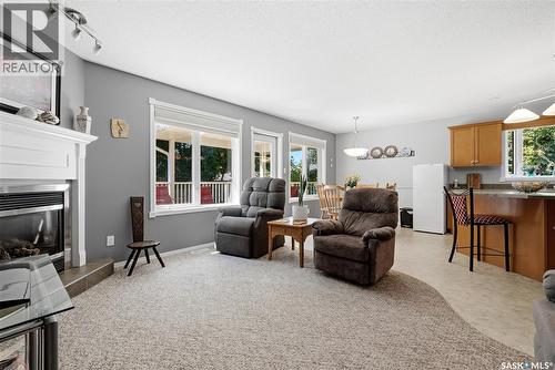 28 Rosedale Avenue, Katepwa Beach, SK - Indoor Photo Showing Living Room With Fireplace