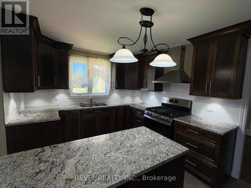 Fauquier - 21 Jacques Avenue, Kapuskasing (Fauquier), ON - Indoor Photo Showing Kitchen With Double Sink