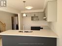 117 Mattingley Street, Brant, ON  - Indoor Photo Showing Kitchen With Double Sink 