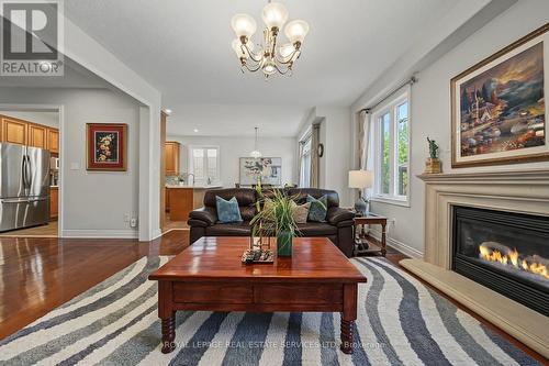 3368 Raspberry Bush Trail, Oakville, ON - Indoor Photo Showing Living Room With Fireplace