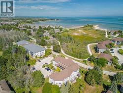 Aerial perspective showcasing a residential community with multiple low-rise buildings - 