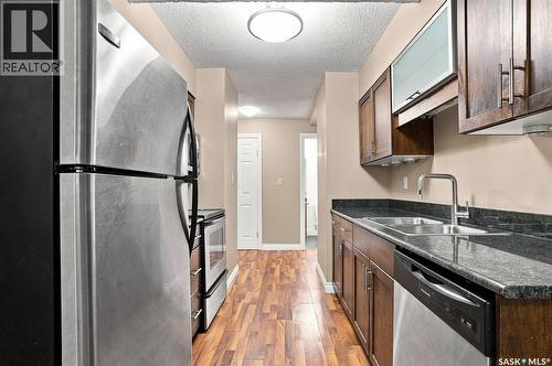 8 104 104Th Street W, Saskatoon, SK - Indoor Photo Showing Kitchen With Stainless Steel Kitchen With Double Sink
