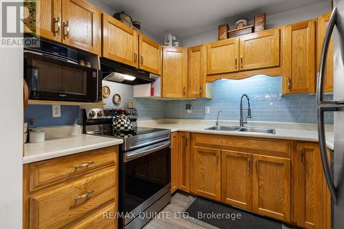 5 - 45 Prince Edward Street, Brighton, ON - Indoor Photo Showing Kitchen With Double Sink