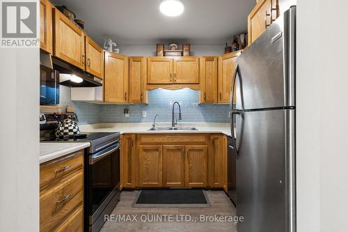 5 - 45 Prince Edward Street, Brighton, ON - Indoor Photo Showing Kitchen With Double Sink