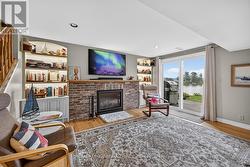 Family room with walkout to patio & riverfront - 