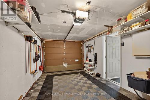 garage - 25 Country Club Place, Brockville, ON - Indoor Photo Showing Garage
