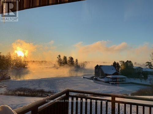 snow and smoke on the water - 25 Country Club Place, Brockville, ON - Outdoor With Body Of Water With View