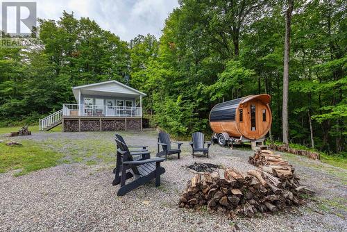 59 Sunset Shores Lane, Frontenac (Frontenac South), ON - Outdoor With Deck Patio Veranda