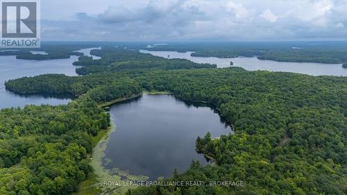 59 Sunset Shores Lane, Frontenac (Frontenac South), ON - Outdoor With Body Of Water With View