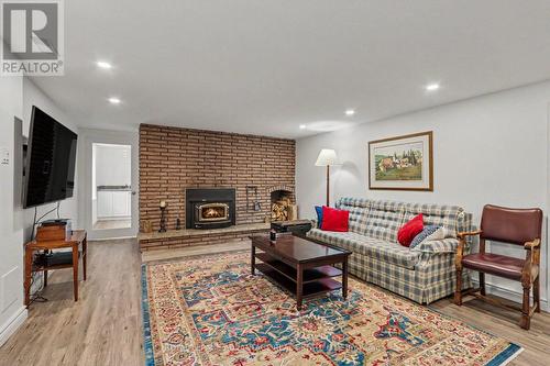 597 Christie Lake Road, Tay Valley, ON - Indoor Photo Showing Living Room With Fireplace