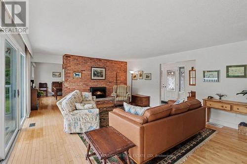 597 Christie Lake Road, Tay Valley, ON - Indoor Photo Showing Living Room With Fireplace