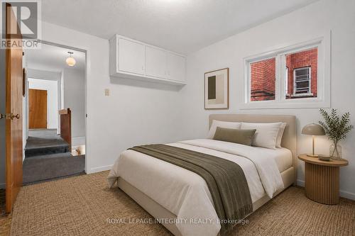 Virtually Staged - 2ND FLOOR BEDROOM 1 - 141 Percy Street, Ottawa, ON - Indoor Photo Showing Bedroom
