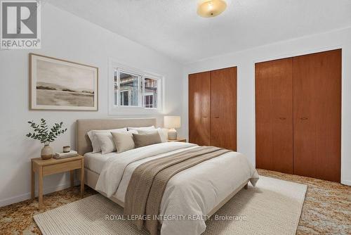 Virtually Staged - 2ND FLOOR BEDROOM 1 - 141 Percy Street, Ottawa, ON - Indoor Photo Showing Bedroom