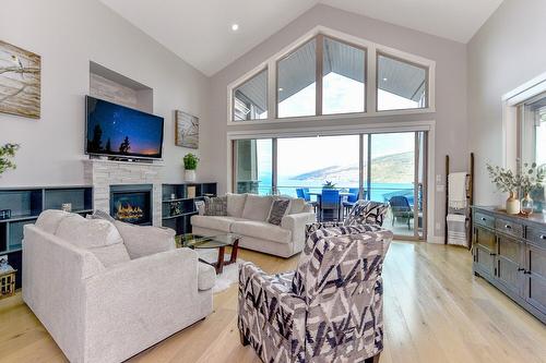 1-6267 Sundstrom Court, Peachland, BC - Indoor Photo Showing Living Room With Fireplace